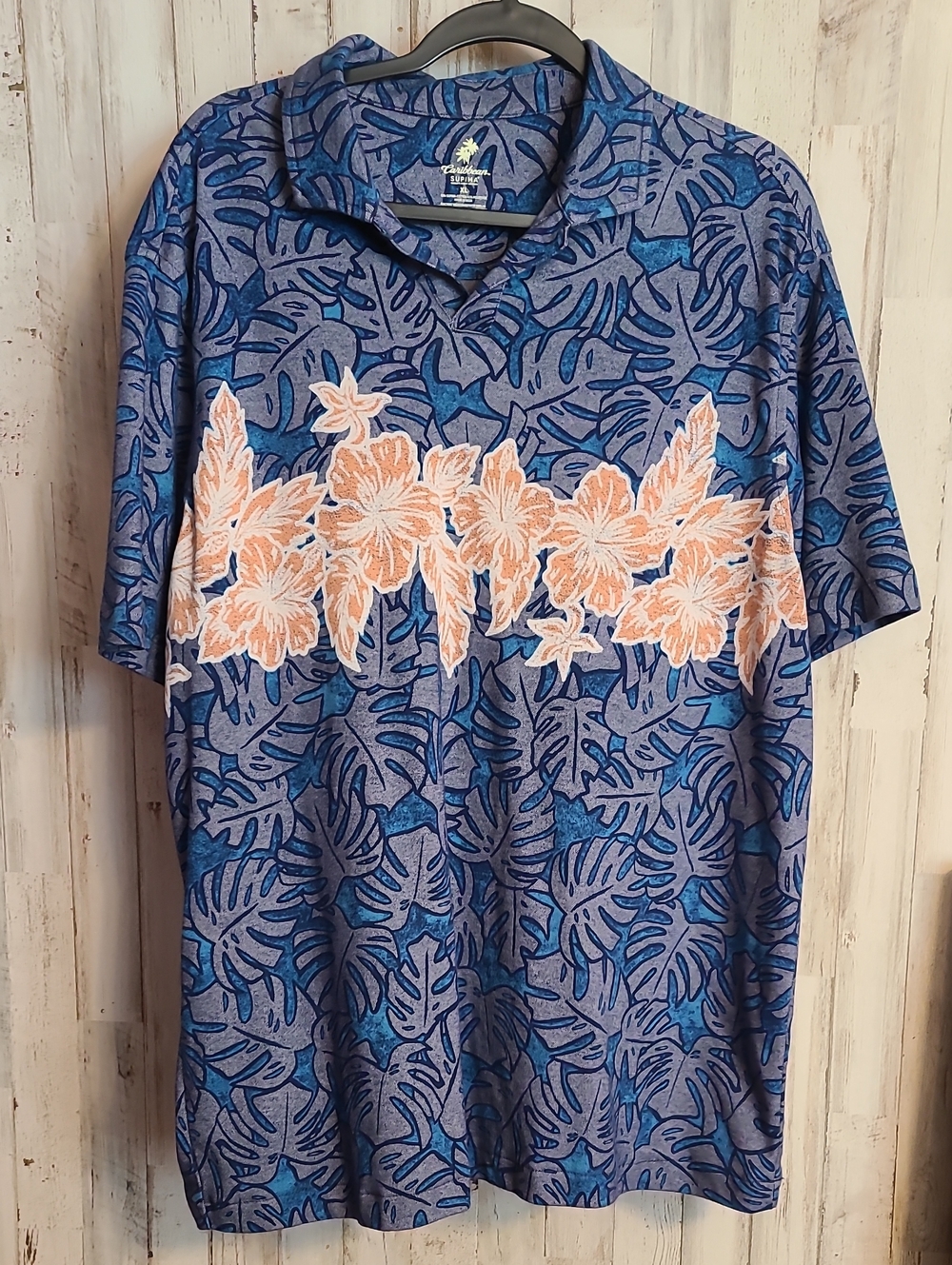 Caribbean Blue Polo with Peach Floral Chest Band
